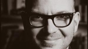 Black and white portrait of Cory Doctorow