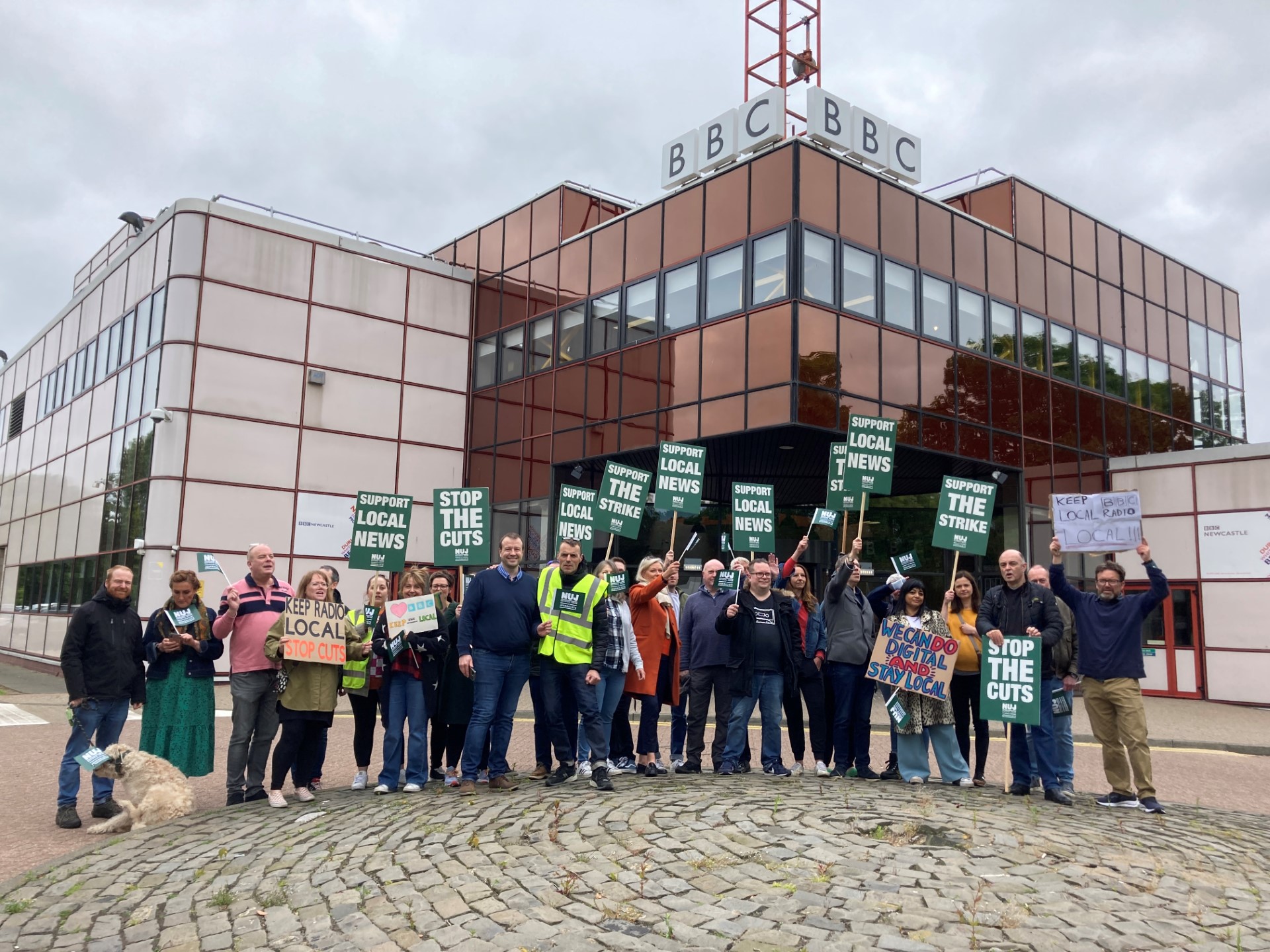 Large NUJ picket line at BBS Newcastle with placards