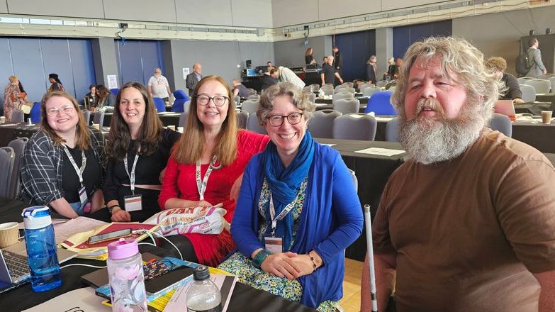 NUJ delegates wearing different coloured tops seated at the TUC Disabled Workers Conference.