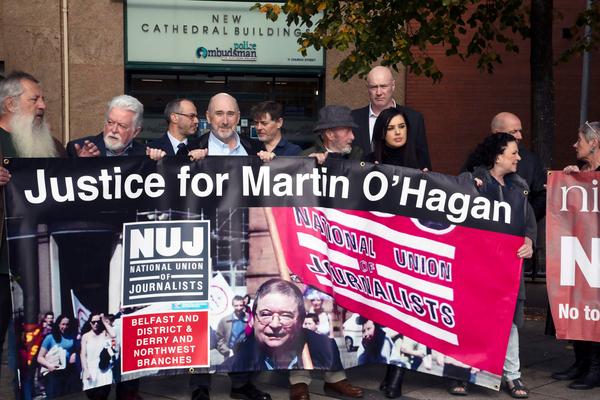 NUJ members hold banner with Martin O'Hagan's image and text 'Justice for Martin O'Hagan'