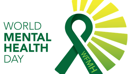A green ribbon next to green text that reads 'World Mental Health Day'.