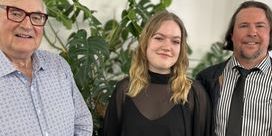 Katie O'Donnell with Richard Blair to her left and and Dr Jaron Murphy to her right.