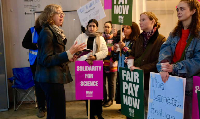 Laura Davison, NUJ general secretary, speaking to Lancet members holding 'Fair Pay Now' and 'Solidarity for Science' placards at a picket.
