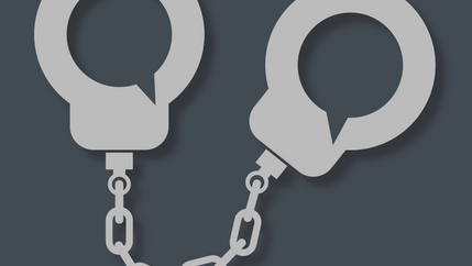 Press freedom handcuffs detail