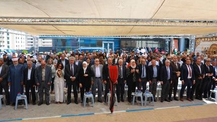 Attendees at the Palestinian Journalists' Syndicate memorial unveiling pose for a picture.
